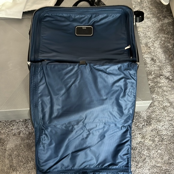 TUMI garment bag and suitcase with shoulder strap. Leather handles. Used once. - Picture 5 of 13